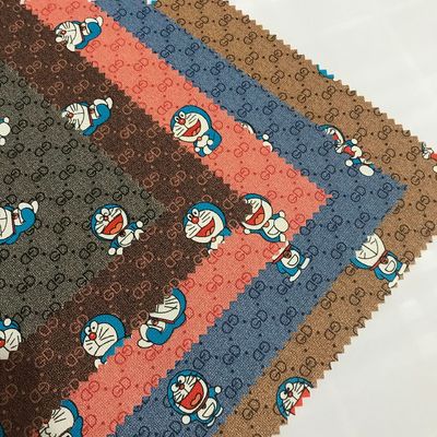 মুদ্রিত কার্টুন জিডি চিঠি জিংল বিড়াল পিভিসি নকল চামড়া ব্যাগ ফোন কেস প্যাকেজ বাক্স চামড়া কাপড়