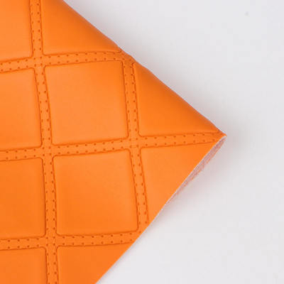 গাড়ির সিট, সোফা, ডেকোরেট ব্যাগ, এবং কৃত্রিম চামড়ার কাপড়ের জন্য পিভিসি রম্বস পঞ্চিং এমবসড স্টাইলের সিনথেটিক চামড়া