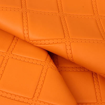 গাড়ির সিট, সোফা, ডেকোরেট ব্যাগ, এবং কৃত্রিম চামড়ার কাপড়ের জন্য পিভিসি রম্বস পঞ্চিং এমবসড স্টাইলের সিনথেটিক চামড়া