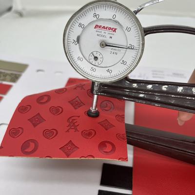 জুতার ব্যাগ প্যাকেজ টেবিল ম্যাটের জন্য PU প্রেসড সিনথেটিক চামড়া, সিনথেটিক ফক্স চামড়ার কাপড়