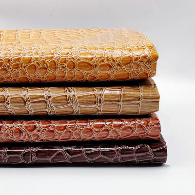 জুতা, ব্যাগ, নোটবুক, আসবাবপত্র ব্যবহারের জন্য হট সেল পিভিসি শাইনি হাই গ্লস সিন্থেটিক লেদার এমবসড স্টোন প্যাটার্ন